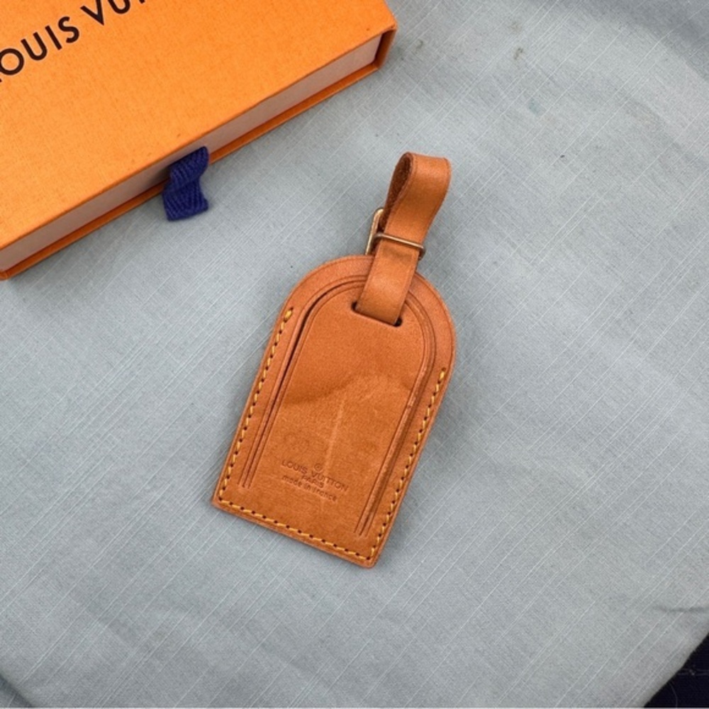 AUTHENTIC Vachetta Leather Luggage tag and loop.